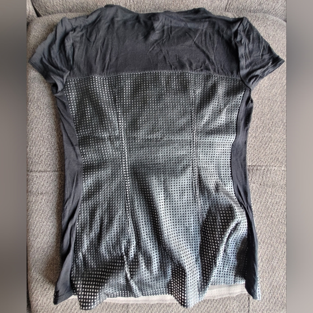 BCBG black short sleeve top in size xxs.